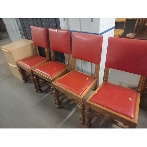 372 - Four oak framed dining chairs and a cabinet