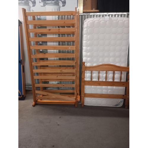 373 - Two pine single bedframes and one mattress