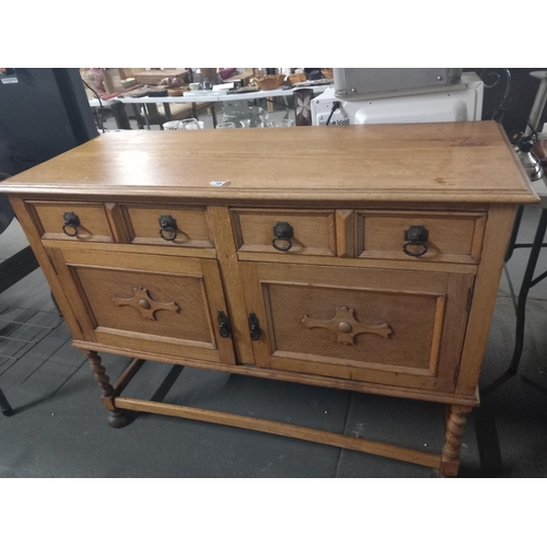 381 - An oak sideboard