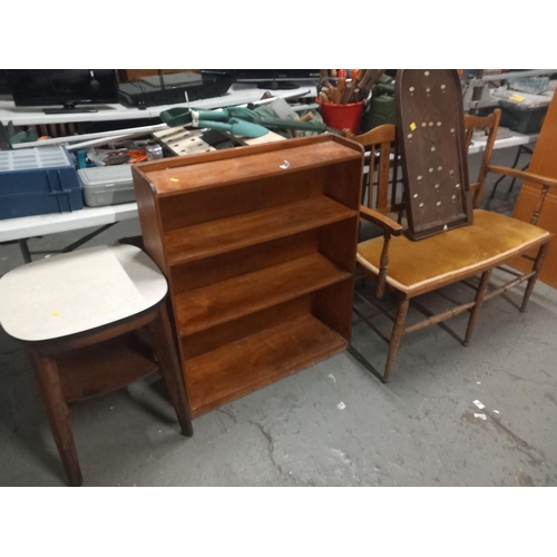 389 - A two seater bench, bookcase, bagatelle game and side table