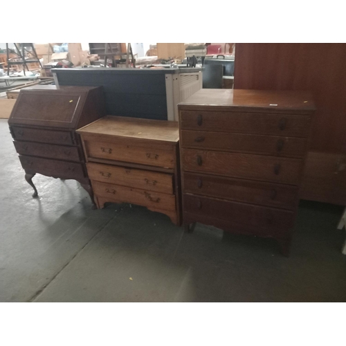 447 - A mahogany bureau and two chest of drawers