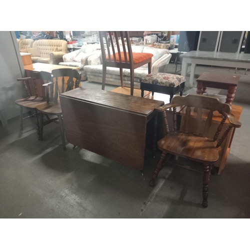 456 - A drop leaf dining table and three chairs