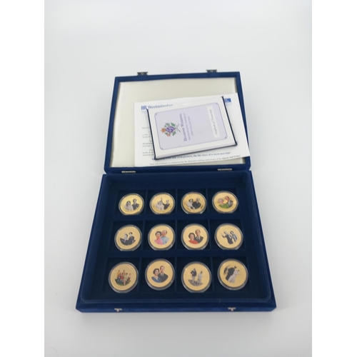 211 - A cased set of twelve diamond wedding photographic mint coins with certificates