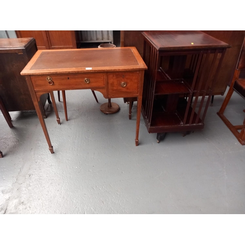 125 - A mahogany bookcase together with a leatherette insert desk