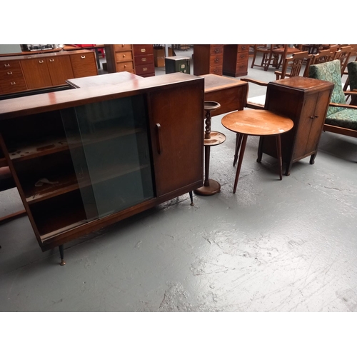 133 - A utility bookcase, candlestick coffee table and record cabinet