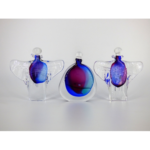 83 - Chris Comins, three perfume bottles.

Engraved signatures, heights 15, 14 & 15cm.