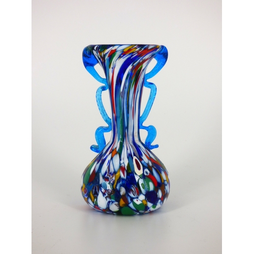 97 - Murano, three vases and five bowls.

Vase heights 14 to 21cm, bowl diameters 9 to 17cm.