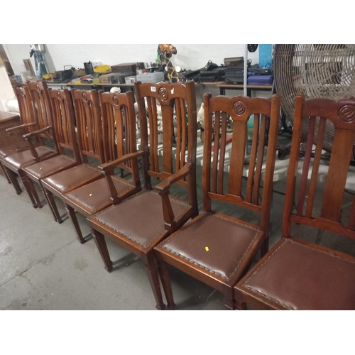 334 - A set of 8 dining chairs to include two carvers