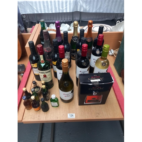 124 - A selection of alcohol to include boxed cognac, red and white wines, etc