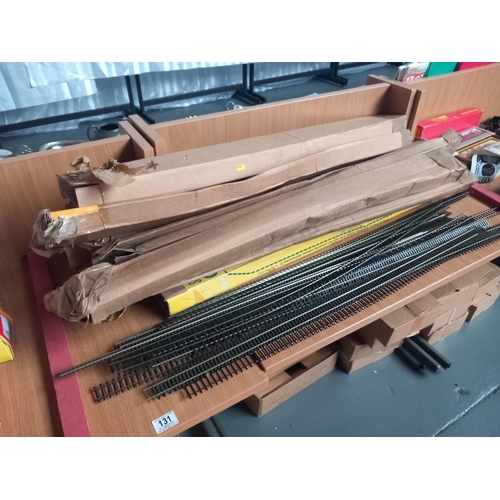 131 - A large quantity of OO gauge track (over 300 meters) and one box of O gauge track