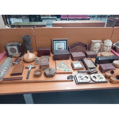 142 - A selection of wooden items including walking cane, boxes, plaques, etc