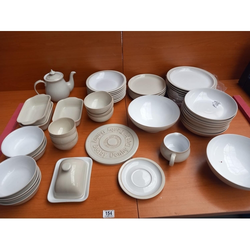 154 - A quantity of Denby - Linen dinner wares