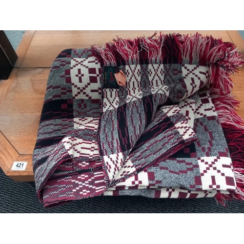 421 - A double Derw woollen Welsh blanket - double sided - storage marks and a tiny hole in one area