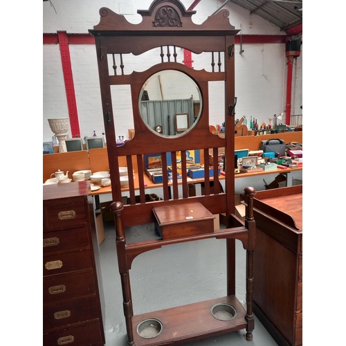 204 - An Edwardian mahogany hall stand