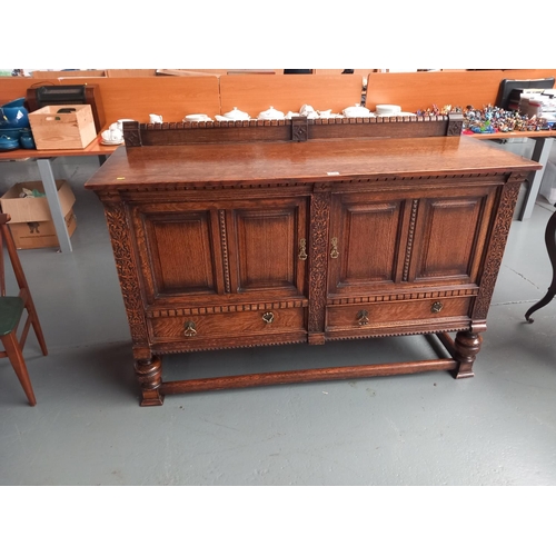 210 - An oak sideboard