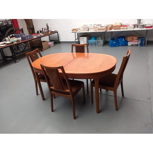 212 - A G Plan extending dining table and four chairs