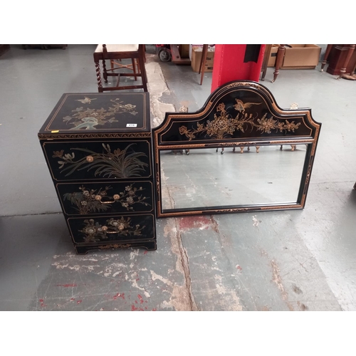 216 - A reproduction Chinese three drawer cabinet and Chinese mirror