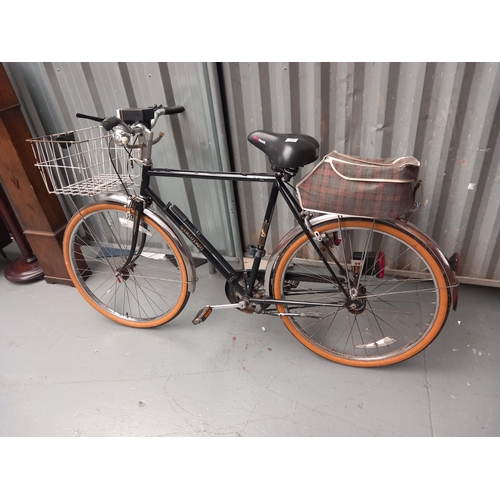 229 - A vintage Peugeot gentleman's bicycle with basket attachment