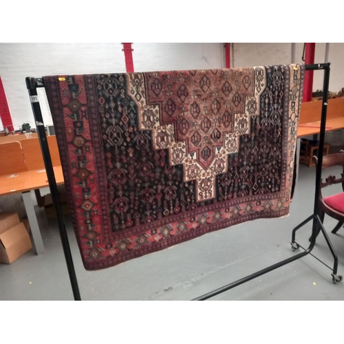 105 - A hand knotted persian rug