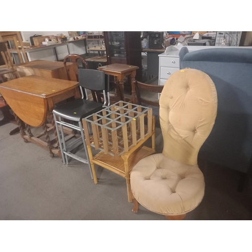 378 - Two stacking bar stools, bamboo side table, nursing chair and an oak drop leaf dining table