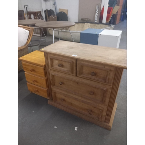 411 - A pine chest of drawers along with a pine bedside cabinet