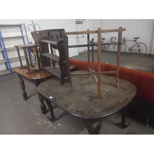 414 - Two extending dining tables, small drop leaf table, side tables and a wall hanging display stand