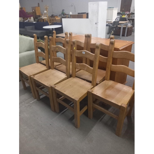 420 - Seven pine dining chairs