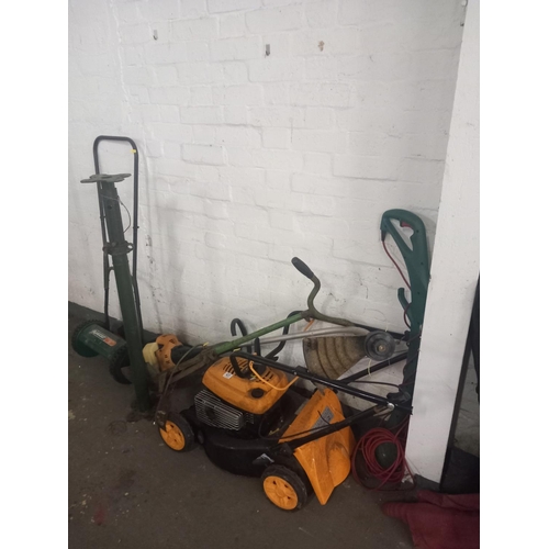 431 - A Briggs and Stratton lawnmower, Qualcast lawnmower, strimmer etc