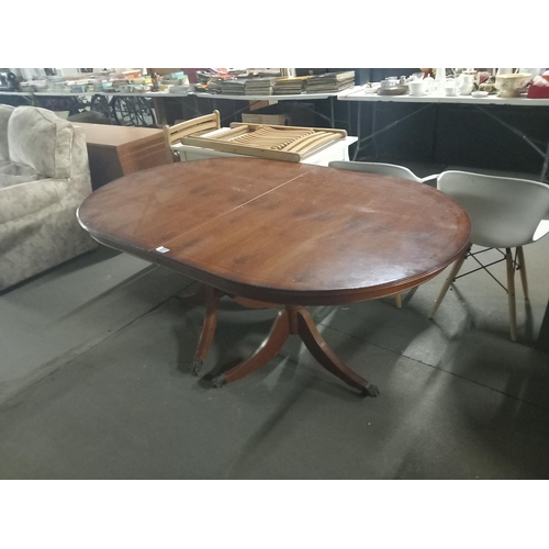 377 - A twin pedestal mahogany dining table