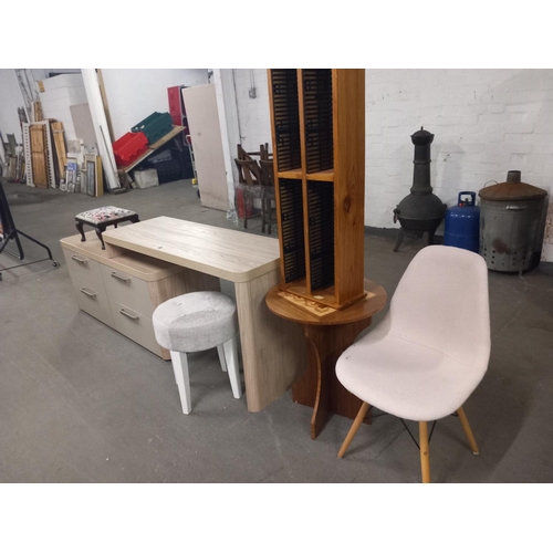 438 - A desk together with a pine CD rack, stools, side table and chair