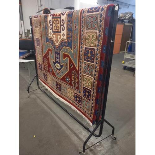 439 - An Indian hand knotted 100% wool carpet approximately 8ft x 5ft