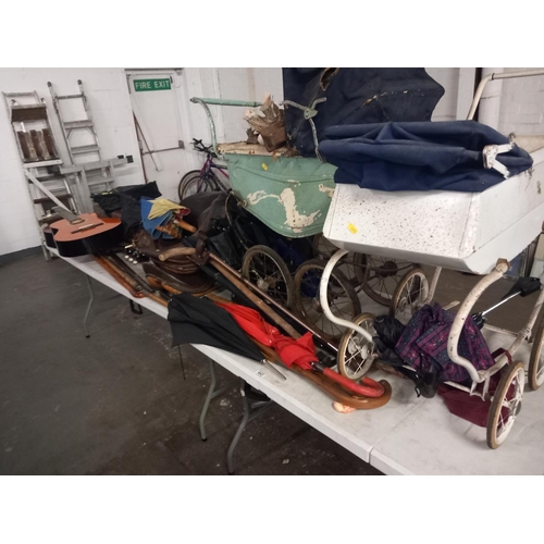 443 - Two vintage prams, walking canes, leather suitcases etc