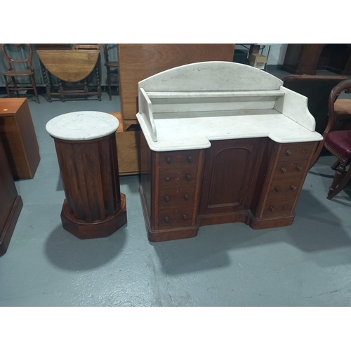 119 - A circular mahogany marble topped pot cupboard along with a mahogany marble topped wash stand