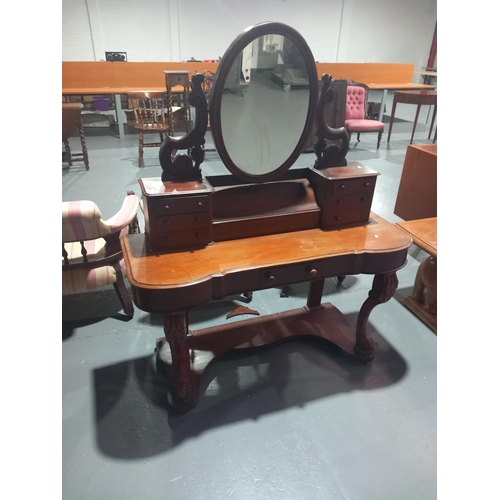 130 - A mahogany duchess dressing table