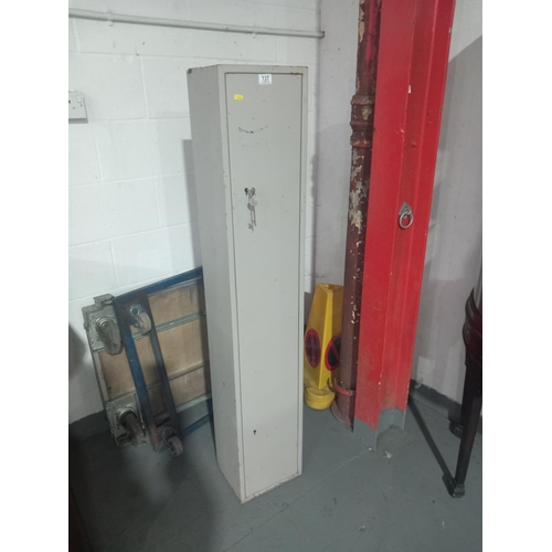 137 - A metal gun safe with key