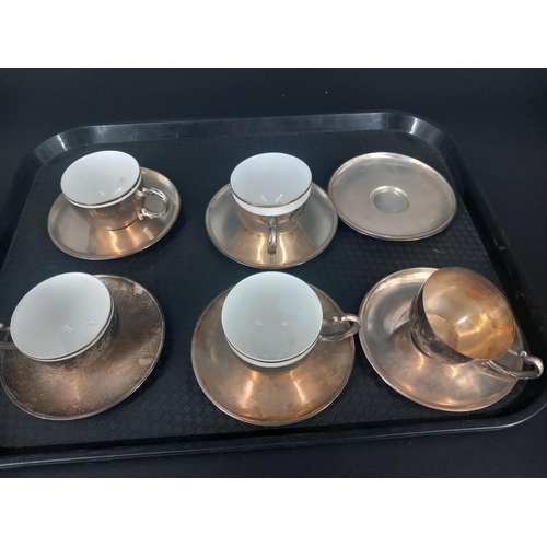 212 - A vintage silver and ceramic part set of hot chocolate cups and saucers - continental - stamped 916/... 