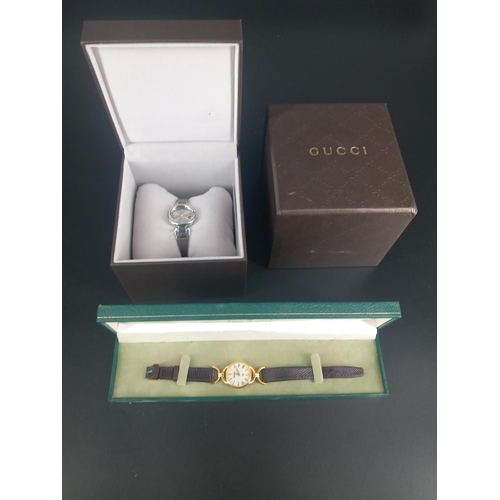 222 - Two boxed ladies watches - both marked Gucci and one with paperwork