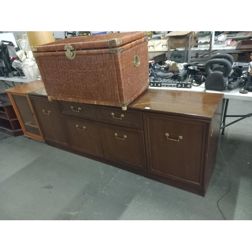 371 - A sideboard, large wicker basket, glass fronted cabinet and one other