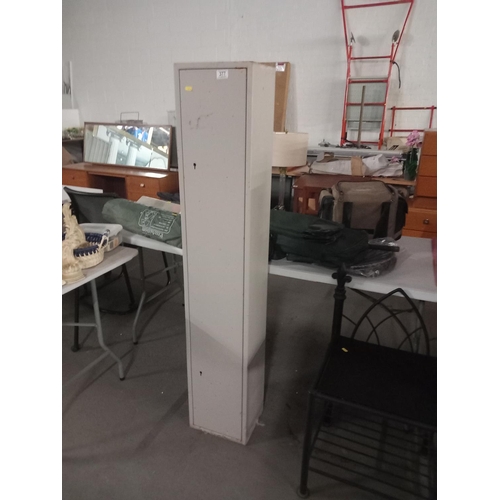 377 - A metal gun safe cabinet