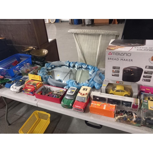 385 - Boxed breadmaker, playworn cars and a dolphin mirror etc