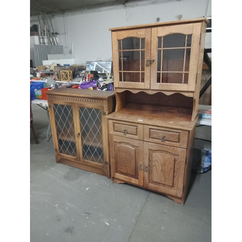 404 - An oak dresser together with an oak glass fronted bookcase