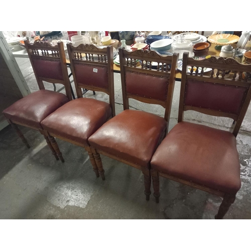 413 - 4 upholstered leatherette dining chairs