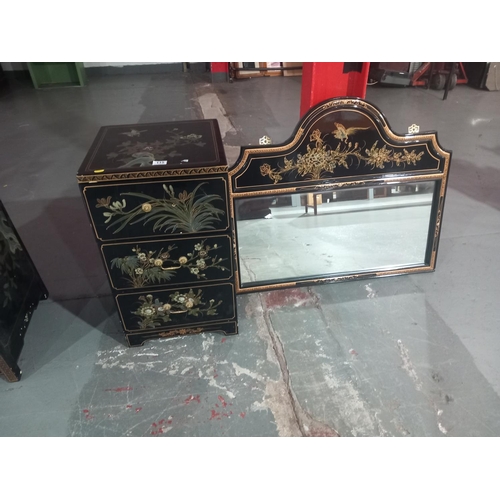 115 - A reproduction Chinese three drawer cabinet and Chinese mirror