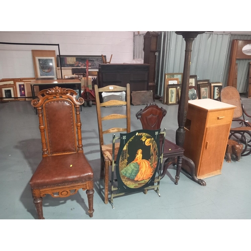 116 - A large oak plant stand, fire screen, cabinet and three chairs