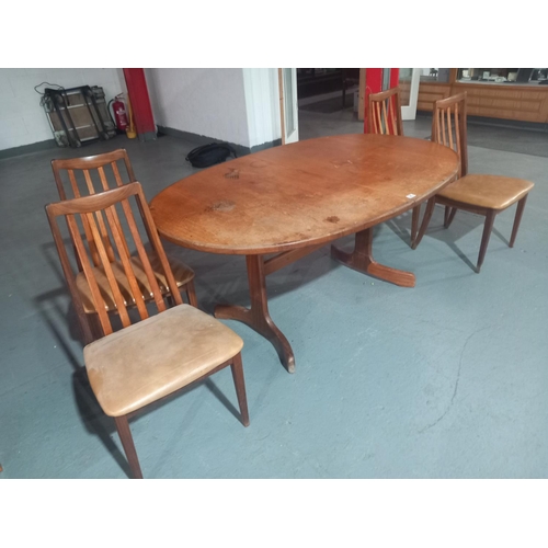 121 - A G Plan oval extending dining table with four chairs