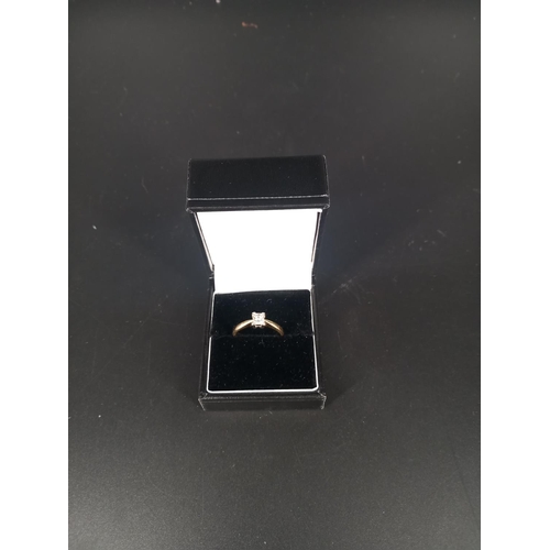 208 - An 18k gold and diamond solitaire engagement ring - square cut diamond