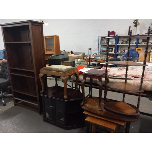 359 - A bookcase, oak nest of tables, foot stool, corner shelf etc