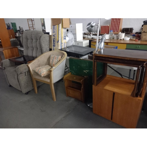 367 - A reclining arm chair, nest of tables, teak cabinet, folding card table, standard lamp etc