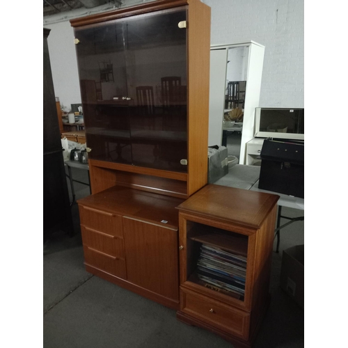 368 - A teak wall cabinet together with a pine record cabinet with mixed genre vinyl records