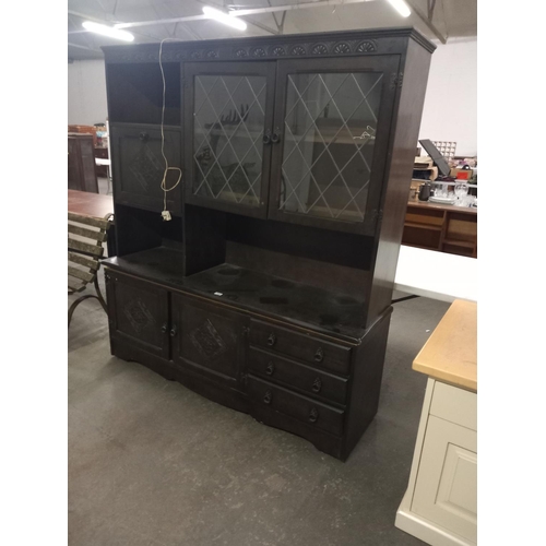 410 - A large oak dresser (two sectioned)